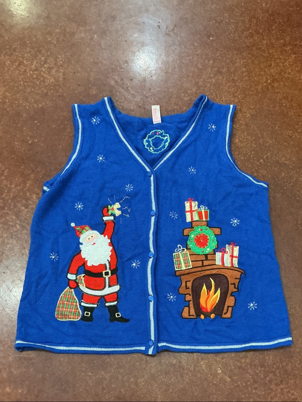 Women’s Blue V-Neck Holiday Sweater Vest with Santa and Fireplace Motif